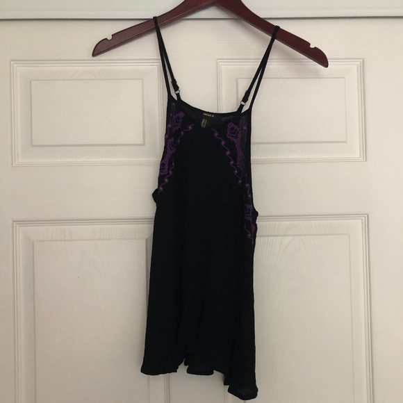 Black tank with purple embellishment on top - Picture 1 of 1